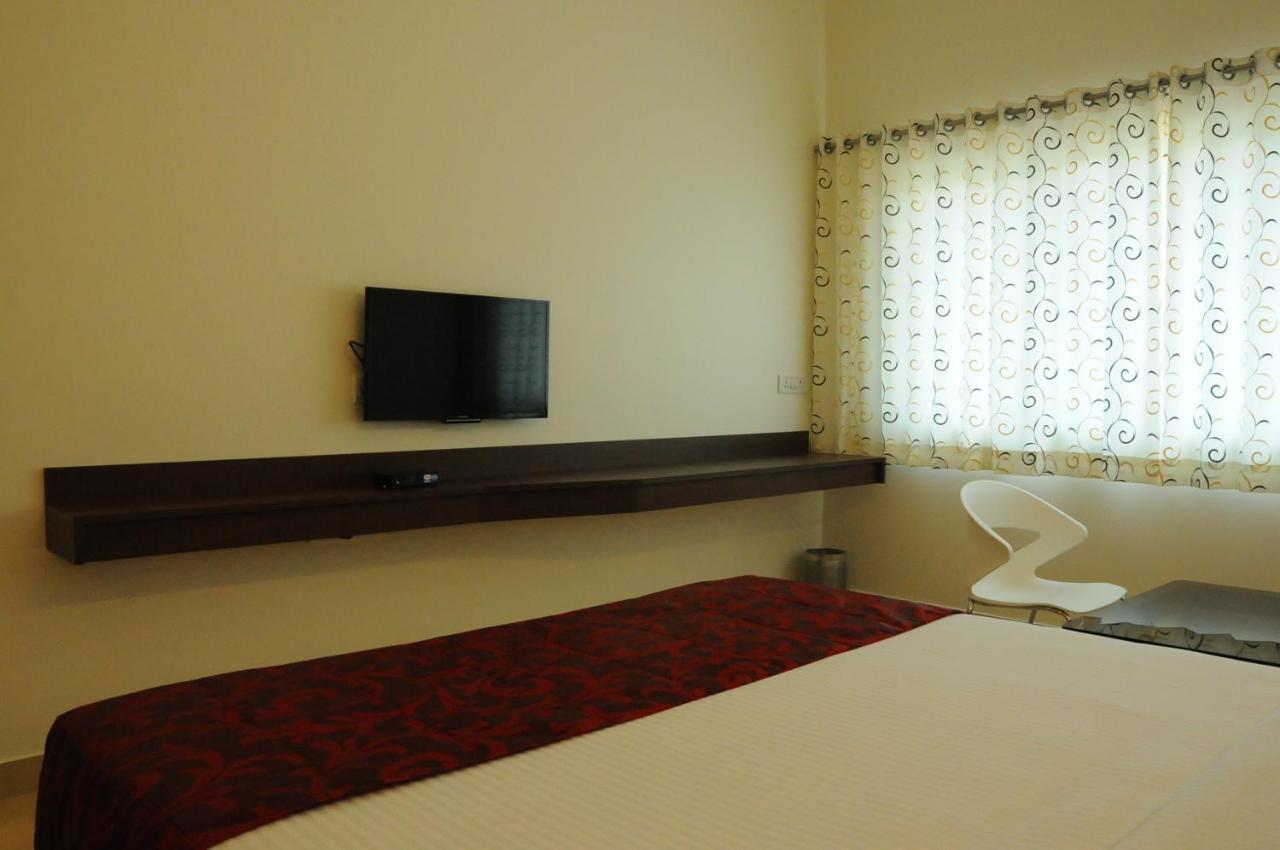 Palguni Residency Hotel Hassan Exterior foto